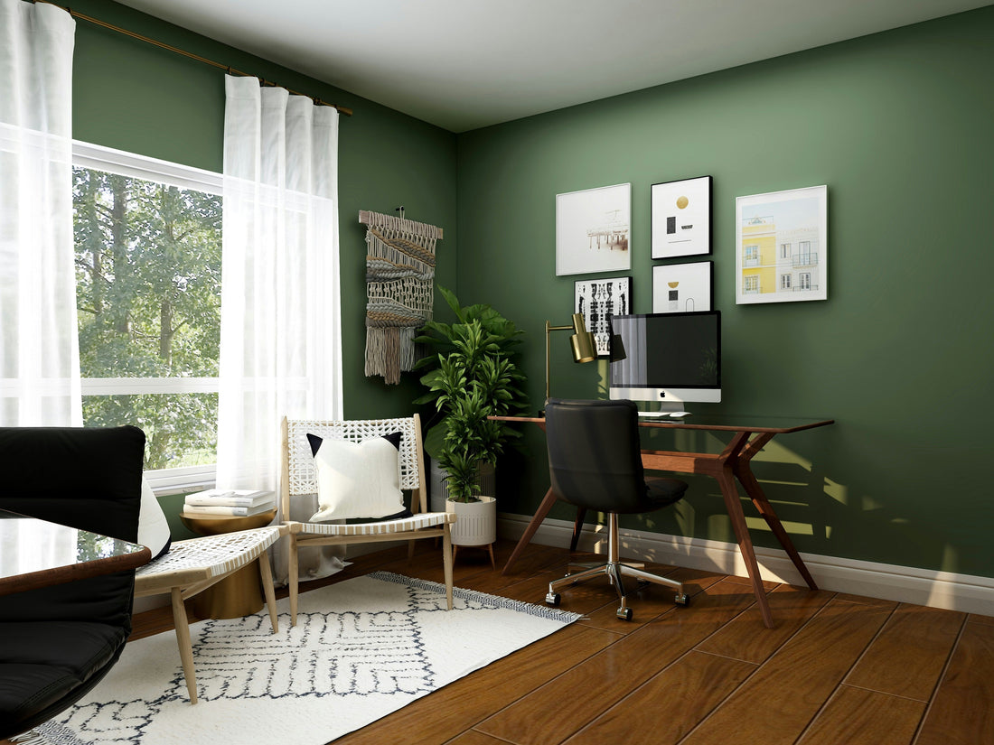 Green home office with a desk
